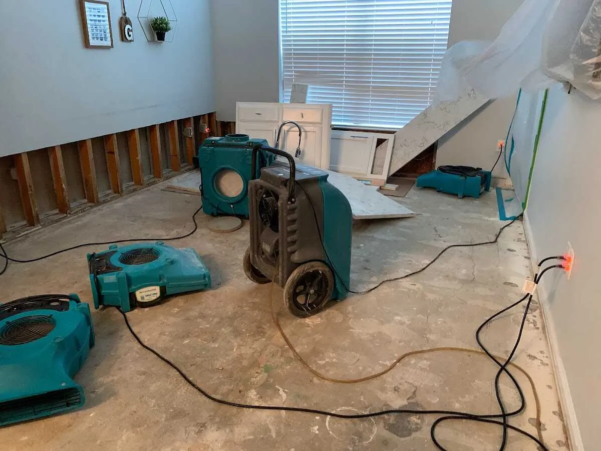 Dehumidifier in flood-cut room for Water Damage Restoration in Carteret